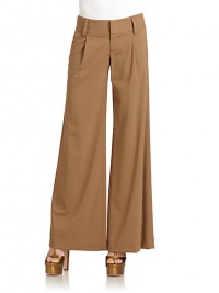 THE LOOKBanded waistZip fly with slide tab closureAngled front pocketsBack welt pocketsTHE FITRise, about 10Inseam, about 31THE MATERIALWool/lycraCARE & ORIGINDry cleanMade in the USAModel shown is 5'10 (177cm) wearing US size 4. THE LOOKBanded waistZip fly with slide tab closureAngled front pocketsBack welt pocketsTHE FITRise, about 10Inseam, about 31THE MATERIALWool/lycraCARE & ORIGINDry cleanMade in the USAModel shown is 5'10 (177cm) wearing US size 4.