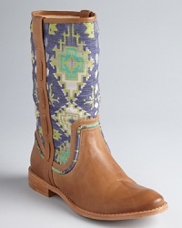 Weave new tales in these tapestry boots from Ella Moss. Mixed media in leather and tribal fabric, they are right, right now, but so unique you can wear them forever. Weave new tales in these tapestry boots from Ella Moss. Mixed media in leather and tribal fabric, they are right, right now, but so unique you can wear them forever.