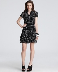 Retro polka dots are seeing a resurgence and this Cynthia Steffe dress is the proof. Flaunting feminine ruffles and a tiered skirt, this updated work style infuses playful style into your nine-to-five.