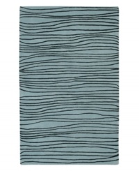 Presenting a new wave in fashionable home decor, this fluid area rug is streaked with black lines across a shimmering ocean-blue ground. Crafted from dense wool pile, the Artist Studio rug offers a uniquely textured feel that is incredibly soft to the touch. Presenting a new wave in fashionable home decor, this fluid area rug is streaked with black lines across a shimmering ocean-blue ground. Crafted from dense wool pile, the Artist Studio rug offers a uniquely textured feel that is incredibly soft to the touch.