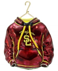 Fitting for USC alum, this hand-painted hoodie ornament trims the tree in Trojan red and gold. Glitter amps up the school and holiday spirit. Fitting for USC alum, this hand-painted hoodie ornament trims the tree in Trojan red and gold. Glitter amps up the school and holiday spirit.
