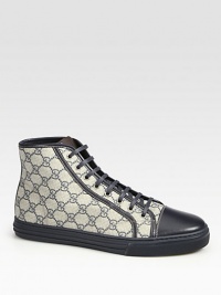 GG Plus with leather trim.Rubber sole with embossed Gucci script logoGucci trademark detailMade in Italy