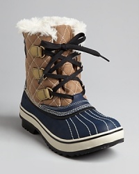 Sorel offers retro, '50s style in these stylish and functional waterproof booties. Faux fur linings make them plushly warm while rubber bottoms keep the damp out. Sorel offers retro, '50s style in these stylish and functional waterproof booties. Faux fur linings make them plushly warm while rubber bottoms keep the damp out.