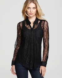 Top off your favorite pair of jeans with this sheer lace GUESS top. Top off your favorite pair of jeans with this sheer lace GUESS top.