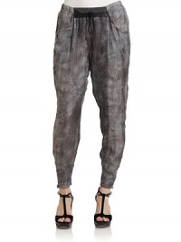 THE LOOKAcid wash printElastic waist with leather detail and drawstring tieDual besom pocketsBanded zip cuffsTHE FITRise, about 12Inseam, about 26THE MATERIALBody: silkSecond fabric: leatherCARE & ORIGINDry cleanImportedModel shown is 5'10½ (179cm) wearing US size Small. THE LOOKAcid wash printElastic waist with leather detail and drawstring tieDual besom pocketsBanded zip cuffsTHE FITRise, about 12Inseam, about 26THE MATERIALBody: silkSecond fabric: leatherCARE & ORIGINDry cleanImportedModel shown is 5'10½ (179cm) wearing US size Small.