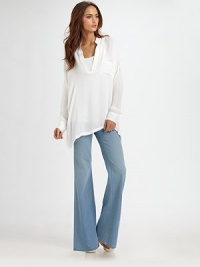 Retro-inspired denim with voluminous flare-leg construction and a bit of stretch. THE FITFitted through hips and thighs Inseam, about 34THE DETAILSZip fly Four-pocket style Button-flap back pockets 91% cotton/8% polyester/1% lycra Machine wash Made in USA of imported fabric Retro-inspired denim with voluminous flare-leg construction and a bit of stretch. THE FITFitted through hips and thighs Inseam, about 34THE DETAILSZip fly Four-pocket style Button-flap back pockets 91% cotton/8% polyester/1% lycra Machine wash Made in USA of imported fabric