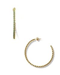 Exude cool in Melinda Marie's hoop earrings made from teeny pod turquoise beads. Exude cool in Melinda Marie's hoop earrings made from teeny pod turquoise beads.