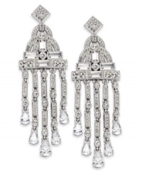 Break the glass ceiling of fashion with this pair of chandelier earrings from Eliot Danori. Crafted from rhodium-plated brass, the earrings sparkle with crystals and cubic zirconias (9 ct. t.w.). Approximate drop: 2-3/4 inches. Break the glass ceiling of fashion with this pair of chandelier earrings from Eliot Danori. Crafted from rhodium-plated brass, the earrings sparkle with crystals and cubic zirconias (9 ct. t.w.). Approximate drop: 2-3/4 inches.
