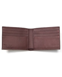 Carry your everyday essentials in this refined signature wallet, an exceptional offering in rarefied leather from Salvatore Ferragamo. Carry your everyday essentials in this refined signature wallet, an exceptional offering in rarefied leather from Salvatore Ferragamo.
