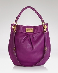Lavish in leather, MARC BY MARC JACOBS' sweetly styled hobo flaunts an enviable shape. Its endlessly versatile shoulder-to-crossbody design is oh so right, day or night. Lavish in leather, MARC BY MARC JACOBS' sweetly styled hobo flaunts an enviable shape. Its endlessly versatile shoulder-to-crossbody design is oh so right, day or night.