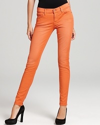 Subtle fading creates a cool sun-bleached effect on these vibrantly hued 7 For All Mankind skinny jeans. Subtle fading creates a cool sun-bleached effect on these vibrantly hued 7 For All Mankind skinny jeans.