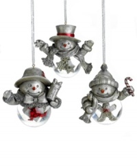 Shake things up. Three friendly snowmen with bellies full of holiday treats are part ornaments, part snow globes and wholly irresistible. With present, snowflake and gingerbread motifs. From Towle. Shake things up. Three friendly snowmen with bellies full of holiday treats are part ornaments, part snow globes and wholly irresistible. With present, snowflake and gingerbread motifs. From Towle.