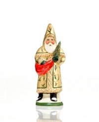 Truly one of a kind, this alluring Santa figurine is cast in an antique chocolate mold, then painted entirely by hand. A distinct gold coat and other fine detail make him a special addition to your Vaillancourt collection. Truly one of a kind, this alluring Santa figurine is cast in an antique chocolate mold, then painted entirely by hand. A distinct gold coat and other fine detail make him a special addition to your Vaillancourt collection.