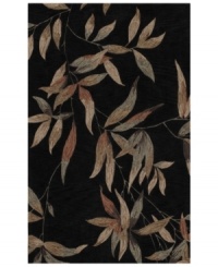 Add subtle drama to your living space with the beautifully luxe look of Dalyn's Studio rug. A lush, leafy motif adorns the deep black rug, while hand-tufting lends incredibly plush texture. Durable weave is perfect for high-traffic areas. Add subtle drama to your living space with the beautifully luxe look of Dalyn's Studio rug. A lush, leafy motif adorns the deep black rug, while hand-tufting lends incredibly plush texture. Durable weave is perfect for high-traffic areas.