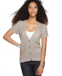 Allover marled knit stitches lend a homespun look to this chic cardigan from DKNY Jeans. Pair it with a cami and jeans for a laid-back ensemble. Allover marled knit stitches lend a homespun look to this chic cardigan from DKNY Jeans. Pair it with a cami and jeans for a laid-back ensemble.