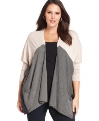 Layer your favorite looks with Design 365's colorblocked plus size cardigan, featuring an open front design.
