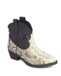 Kick it up in these Sam Edelman Western booties that feature classic cowgirl style: stacke heels, scrollwork leather, and snake-embossed leather. Kick it up in these Sam Edelman Western booties that feature classic cowgirl style: stacke heels, scrollwork leather, and snake-embossed leather.