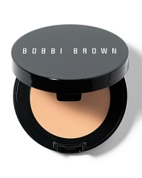 Bobbi's secret to looking fresh and well-rested: a yellow-based concealer that instantly camouflages dark circles. Bobbi's long-wearing Creamy Concealer gives you quick, just-right coverage. The new and improved formula is richer and creamier, so it goes on easy, blends smoothly and stays put. Plus it's infused with skin conditioners to protect the delicate under-eye area. Your ideal shade of Creamy Concealer is one shade lighter than your foundation.
