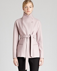 An unmistakably chic funnel neck jacket, crafted from soft brushed wool, flaunts a self-tie belt to define your silhouette. A classic look with feminine flair, this elevated piece is the season's must-have acquisition. An unmistakably chic funnel neck jacket, crafted from soft brushed wool, flaunts a self-tie belt to define your silhouette. A classic look with feminine flair, this elevated piece is the season's must-have acquisition.