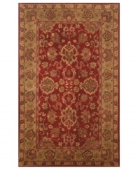 Drawing inspiration from the sandy ruins of ancient Petra and the traditional designs of India, this elegant, hand-tufted rug presents a rich decorative history set against a subtle red backdrop and accented with multiple gold and green tones. Drawing inspiration from the sandy ruins of ancient Petra and the traditional designs of India, this elegant, hand-tufted rug presents a rich decorative history set against a subtle red backdrop and accented with multiple gold and green tones.