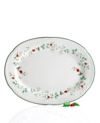 Serve up your best Christmas roast yet on this elegant platter featuring the timeless Winterberry pattern from Pfaltzgraff's holiday collection of dinnerware and dishes. Raised, hand-painted holly leaves and bright red berries dance along the scalloped sides. Serve up your best Christmas roast yet on this elegant platter featuring the timeless Winterberry pattern from Pfaltzgraff's holiday collection of dinnerware and dishes. Raised, hand-painted holly leaves and bright red berries dance along the scalloped sides.