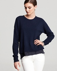 The silky detailing at the hem of this Rebecca Taylor sweater adds a luxurious touch to a classic crewneck. The silky detailing at the hem of this Rebecca Taylor sweater adds a luxurious touch to a classic crewneck.