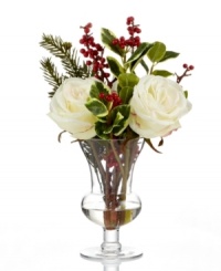 A fresh bouquet without the fuss. White roses and holiday greenery in a simple urn provide long-lasting, family-friendly cheer from one year to the next. A fresh bouquet without the fuss. White roses and holiday greenery in a simple urn provide long-lasting, family-friendly cheer from one year to the next.