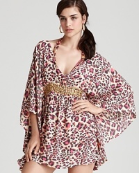 Sweeping kimono sleeves and a beaded waistband make this Ondademar coverup striking. Wear over the matching bikini for extra impact. Sweeping kimono sleeves and a beaded waistband make this Ondademar coverup striking. Wear over the matching bikini for extra impact.