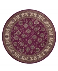 A round rug that is ideal for the center of rooms. Inspired by classic Persian art and culture, this rug features an arresting color palette of burnt red and neutral hues and a beautiful, curvilinear floral pattern. Easy-care polypropylene ensures durability. A round rug that is ideal for the center of rooms. Inspired by classic Persian art and culture, this rug features an arresting color palette of burnt red and neutral hues and a beautiful, curvilinear floral pattern. Easy-care polypropylene ensures durability.