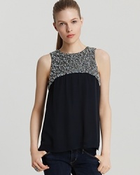Shimmer in celestial style with this French Connection embellished top adorned with sequins and beads at the yoke and upper back. Flowing gracefully over your silhouette, the decadent design is a must-have when you're working the party circuit. Shimmer in celestial style with this French Connection embellished top adorned with sequins and beads at the yoke and upper back. Flowing gracefully over your silhouette, the decadent design is a must-have when you're working the party circuit.