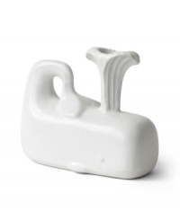 Brilliant beluga. Jonathan Adler brings the whale to life and to light with this glazed white candlestick, crafted of high-fired stoneware. Brilliant beluga. Jonathan Adler brings the whale to life and to light with this glazed white candlestick, crafted of high-fired stoneware.