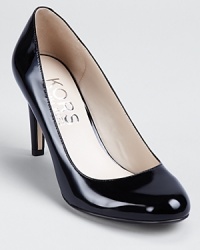 It doesn't get more classic than this--these KORS Michael Kors pumps showcase timeless elegance in slick patent leather. It doesn't get more classic than this--these KORS Michael Kors pumps showcase timeless elegance in slick patent leather.
