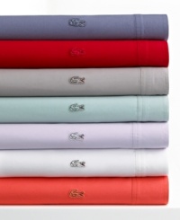 Ultimately soft in brushed cotton twill, this Lacoste sheet set is the perfect blend of sporty style and laid-back comfort. The signature Lacoste croc logo adds preppy flair to the flat sheet and pillowcases, now in a wide array of vivid hues. Croc logo coordinates with sheet color. Ultimately soft in brushed cotton twill, this Lacoste sheet set is the perfect blend of sporty style and laid-back comfort. The signature Lacoste croc logo adds preppy flair to the flat sheet and pillowcases, now in a wide array of vivid hues. Croc logo coordinates with sheet color.