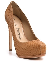 Snake-embossed leather sculpted pumps, done up in a rich neutral hue. By Pour La Victoire.