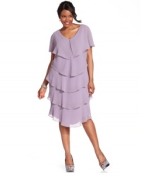 Get into the swing of things in this flirty, tiered Patra plus size dress with a hint of sparkle at the neckline. Get into the swing of things in this flirty, tiered Patra plus size dress with a hint of sparkle at the neckline.
