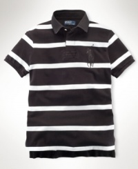 A short-sleeved rugby is cut for a classic, comfortable fit from durable cotton mesh with bold stripes for masculine polish. A short-sleeved rugby is cut for a classic, comfortable fit from durable cotton mesh with bold stripes for masculine polish.