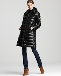 Keep toasty in this head-turning puffer from Moncler. The longer length makes for a sleek, streamlined silhouette. Keep toasty in this head-turning puffer from Moncler. The longer length makes for a sleek, streamlined silhouette.
