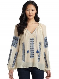 THE LOOKSheer designRound split-neck with tie tassel closureLong elastic cuff sleevesTonal embroidered necklineContrast embroidered accentsTHE FITAbout 26 from shoulder to hemTHE MATERIALSilkCARE & ORIGINDry cleanImportedModel shown is 5'10 (177cm) wearing US size Small. THE LOOKSheer designRound split-neck with tie tassel closureLong elastic cuff sleevesTonal embroidered necklineContrast embroidered accentsTHE FITAbout 26 from shoulder to hemTHE MATERIALSilkCARE & ORIGINDry cleanImportedModel shown is 5'10 (177cm) wearing US size Small.