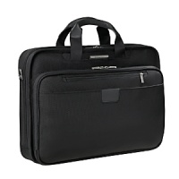 Extremely compact and easy to carry, this slim Briggs & Riley briefcase holds all your tech gear without slowing you down. It boasts a SpeedThru™ pocket for hassle-free airport security checks, a porthole for an MP3 player headphone cord, and organizer pockets for pens, business cards, flash sticks, a key fob and more. Slip back pocket allows case to slide over the Outsider® luggage handles. Fits most 14 laptops. Extremely compact and easy to carry, this slim Briggs & Riley briefcase holds all your tech gear without slowing you down. It boasts a SpeedThru™ pocket for hassle-free airport security checks, a porthole for an MP3 player headphone cord, and organizer pockets for pens, business cards, flash sticks, a key fob and more. Slip back pocket allows case to slide over the Outsider® luggage handles. Fits most 14 laptops.