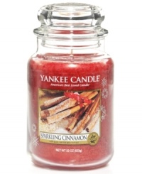 The gift that keeps on giving, this large Sparkling Cinnamon candle prolongs the season with a festive red hue and the smell of spicy cinnamon and cloves. A holiday classic from Yankee Candle. The gift that keeps on giving, this large Sparkling Cinnamon candle prolongs the season with a festive red hue and the smell of spicy cinnamon and cloves. A holiday classic from Yankee Candle.