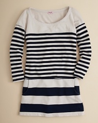 Mixed skinny and wide stripes embellish this three-quarter sleeve tunic finished with a sporty kangaroo pocket. Mixed skinny and wide stripes embellish this three-quarter sleeve tunic finished with a sporty kangaroo pocket.