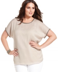 Beading beautifies DKNYC's short sleeve plus size top for an ideal day to night look! Beading beautifies DKNYC's short sleeve plus size top for an ideal day to night look!