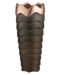 Featuring a bold new look for Nambe's signature metal, the Copper Canyon bud vase captures the striking beauty of the American Southwest in brilliant copper. A rippled shape inspired by the region's wind- and water-worn canyons is finished with a rustic green patina. Featuring a bold new look for Nambe's signature metal, the Copper Canyon bud vase captures the striking beauty of the American Southwest in brilliant copper. A rippled shape inspired by the region's wind- and water-worn canyons is finished with a rustic green patina.