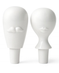 A perfect pair, Mr. and Mrs. Muse bottle stoppers grace the modern table with the chic aesthetic of Jonathan Adler. Featuring high-fired porcelain with a glossy white finish. A perfect pair, Mr. and Mrs. Muse bottle stoppers grace the modern table with the chic aesthetic of Jonathan Adler. Featuring high-fired porcelain with a glossy white finish.