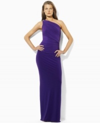 The sweeping glamour of a one-shoulder silhouette is captured in the elegant matte jersey Chana dress, embellished with delicate ruching and a dazzling crystal-encrusted accent. The sweeping glamour of a one-shoulder silhouette is captured in the elegant matte jersey Chana dress, embellished with delicate ruching and a dazzling crystal-encrusted accent.