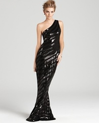 Bold stripes of sparkling sequins makes a glam statement on this David Meister one-shoulder gown. Bold stripes of sparkling sequins makes a glam statement on this David Meister one-shoulder gown.