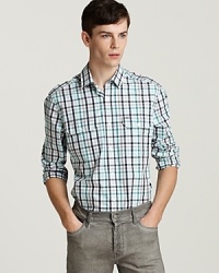 A handsome allover check pattern livens things up when you wear this top-notch button-down rendered in crisp, clean cotton poplin. A handsome allover check pattern livens things up when you wear this top-notch button-down rendered in crisp, clean cotton poplin.