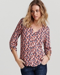Freshen up up your basics portfolio with this floral-print Splendid top, featuring a button front for polish. Freshen up up your basics portfolio with this floral-print Splendid top, featuring a button front for polish.