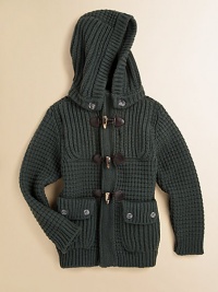 A rustic hip-length layer in a chunky waffle knit with a versatile detachable hood and preppy toggle details.Detachable button hoodRibbed stand collarLong sleeves with ribbed cuffsElbow patch detailFront toggle closureFront patch button pocketsRibbed hem80% wool/20% nylonHand washMade in Italy A rustic hip-length layer in a chunky waffle knit with a versatile detachable hood and preppy toggle details.Detachable button hoodRibbed stand collarLong sleeves with ribbed cuffsElbow patch detailFront toggle closureFront patch button pocketsRibbed hem80% wool/20% nylonHand washMade in Italy