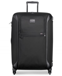 Full speed ahead! A marriage of innovative design & sleek style, this lightweight travel pro is crafted from a smart hybrid blend of flexible ballistic nylon & protective hardside material. An extra-large packing capacity coasts effortlessly on 360º spinners that are brilliantly guided by Tumi's patented impact-resistant X-Brace™ handle system, which stands up to the wear & tear of busy travel. Lifetime warranty. Full speed ahead! A marriage of innovative design & sleek style, this lightweight travel pro is crafted from a smart hybrid blend of flexible ballistic nylon & protective hardside material. An extra-large packing capacity coasts effortlessly on 360º spinners that are brilliantly guided by Tumi's patented impact-resistant X-Brace™ handle system, which stands up to the wear & tear of busy travel. Lifetime warranty.